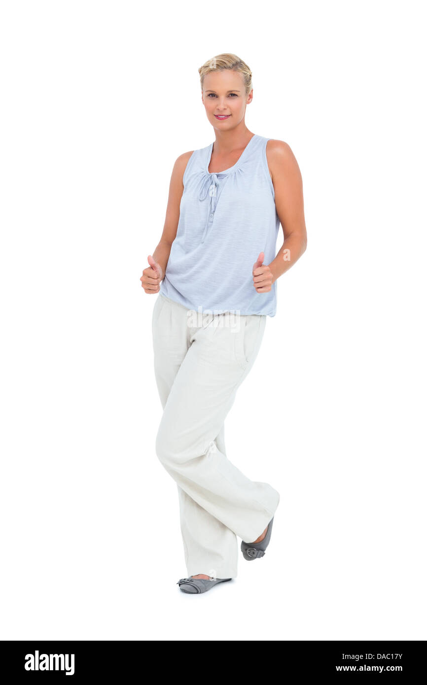 Blonde woman standing thumbs up hi-res stock photography and images - Alamy