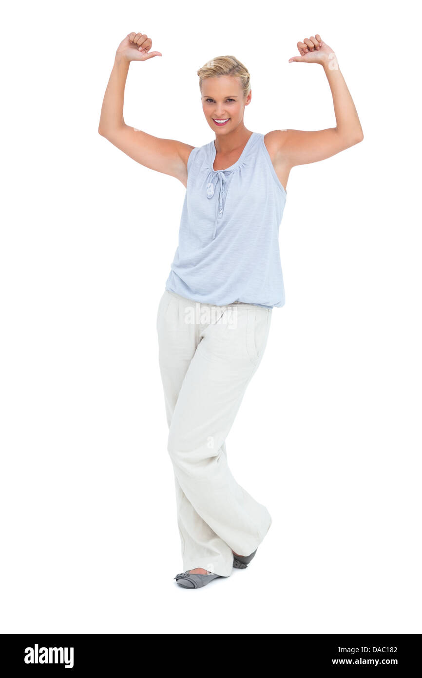 Blonde woman standing thumbs up hi-res stock photography and images - Alamy