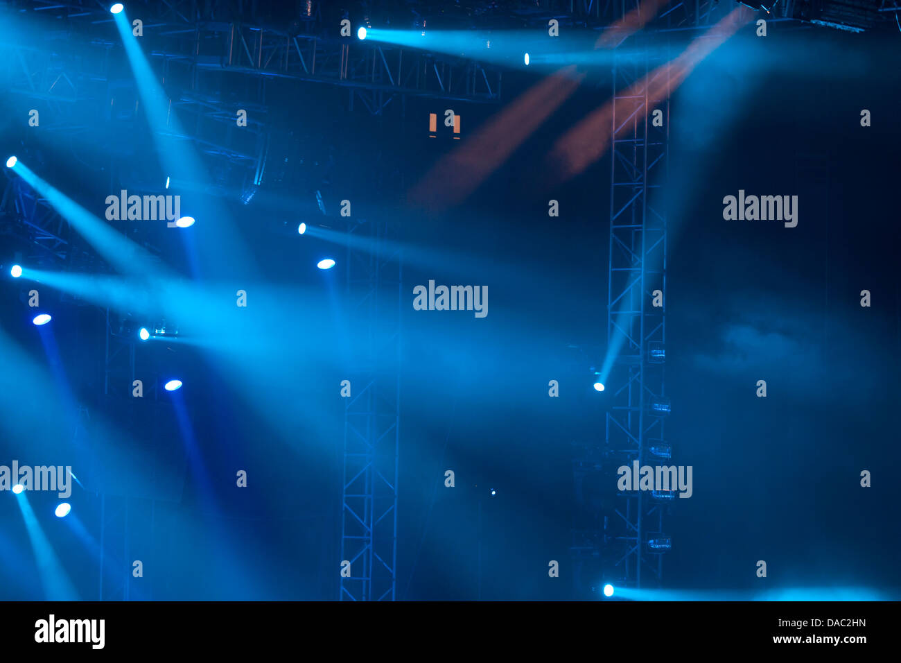 Image of blue stage lights, thick fog creates drama Stock Photo