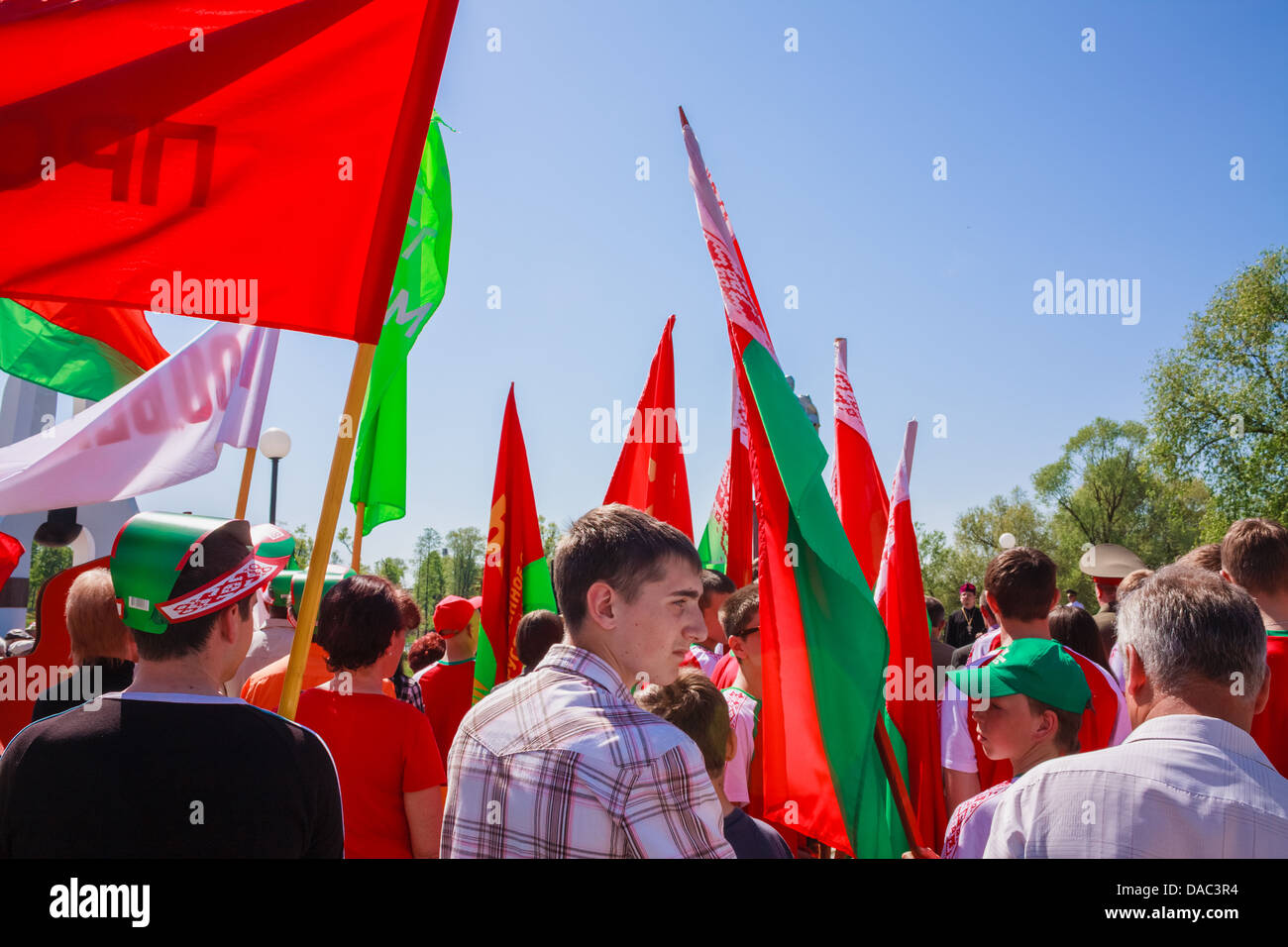The youth from patriotic party BRSM holds flags on the celebration of Victory Day. GOMEL, BELARUS - MAY 9 2013 Stock Photo