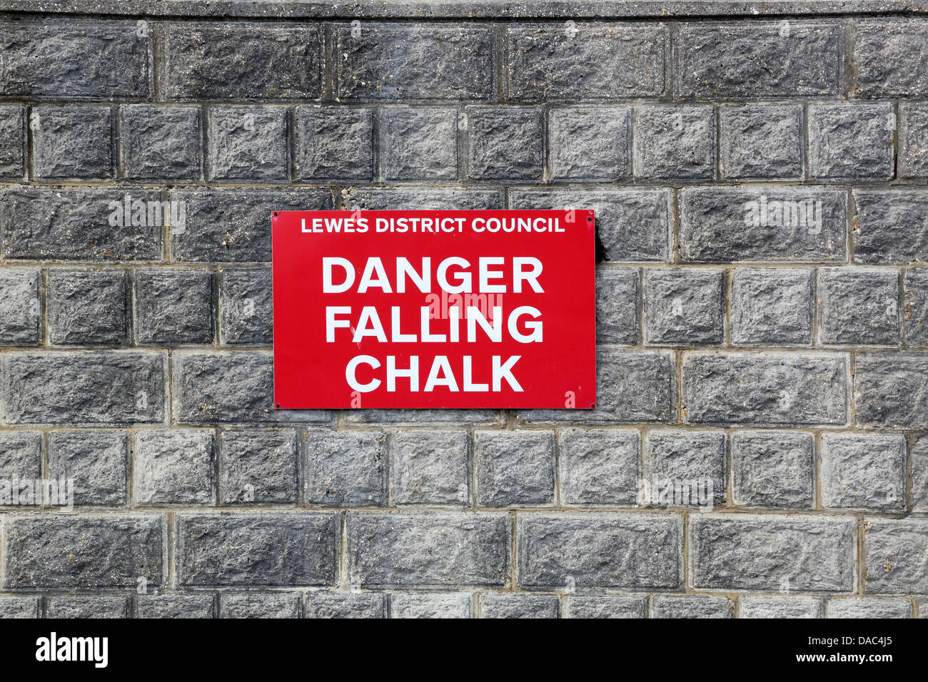 warning sign at the chalk cliffs at peacehaven on the sussex coast ...