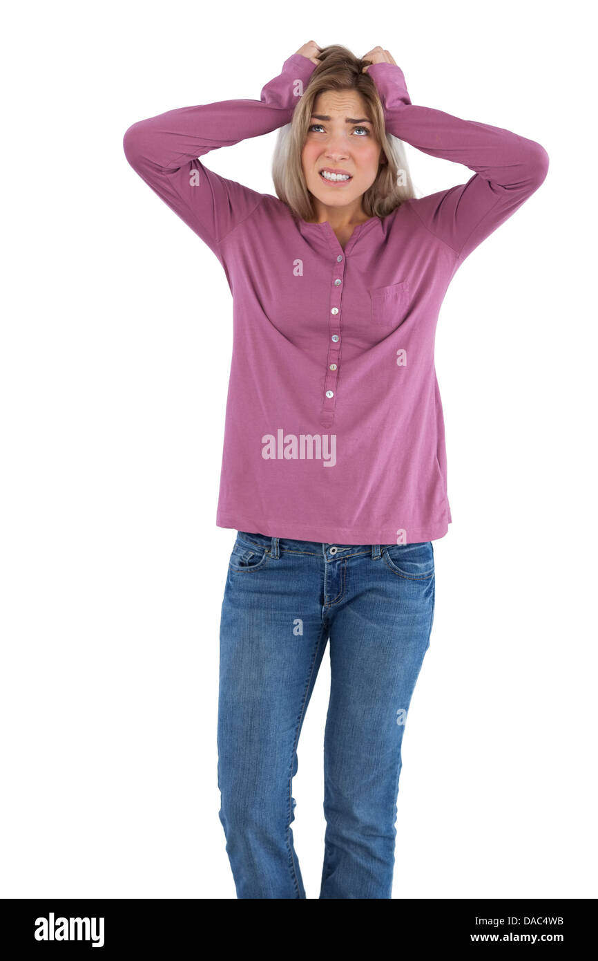 Woman standing with hands on head hi-res stock photography and images ...