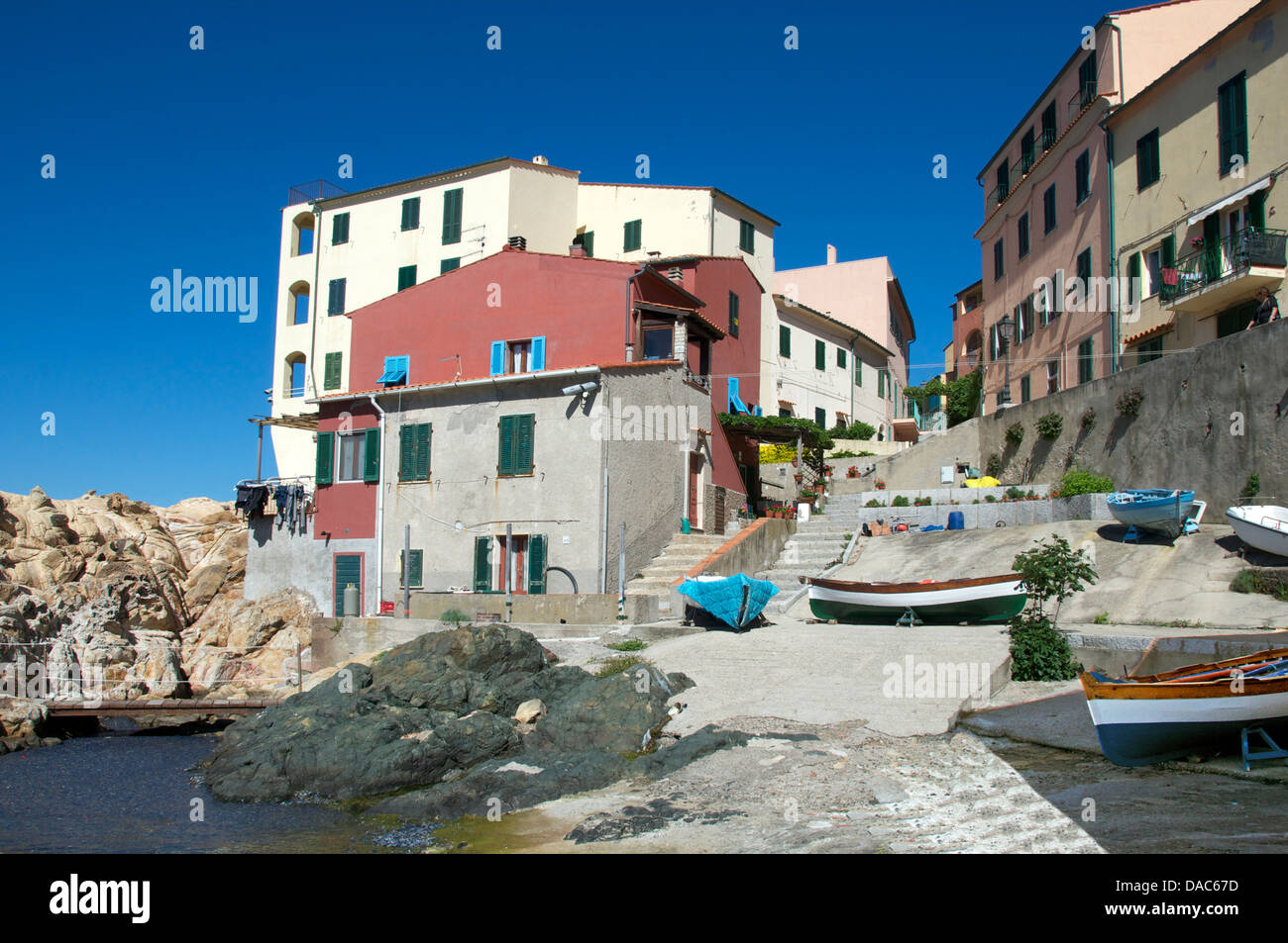 Fishing boats and houses Marciana Marina Elba Tuscany Italy Stock Photo