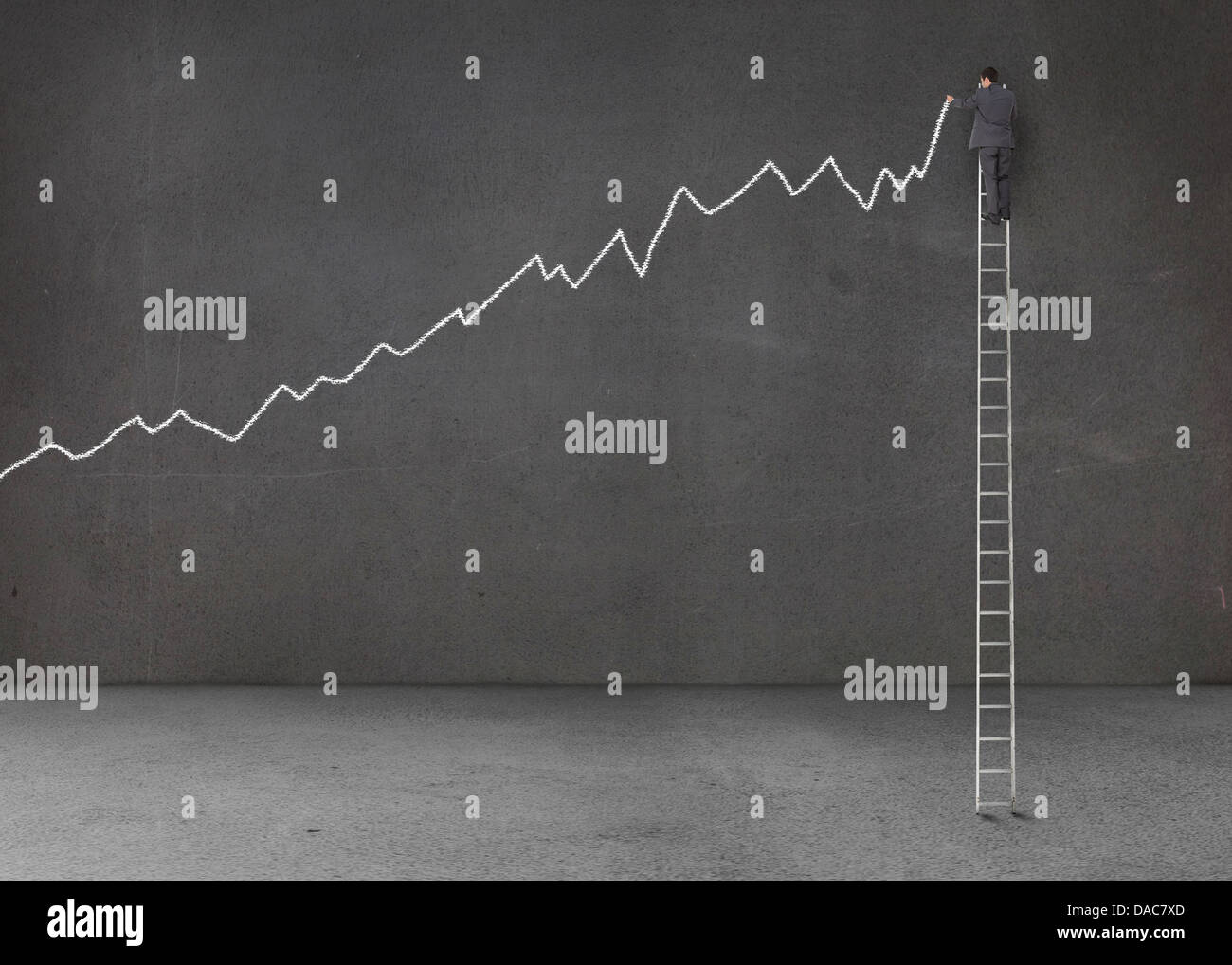 Businessman standing on a giant ladder Stock Photo - Alamy