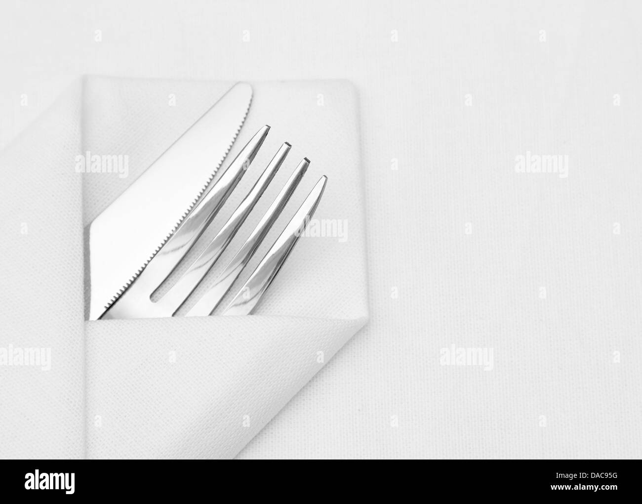 Place setting, cutlery and white napkin Stock Photo Alamy