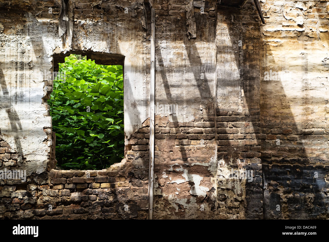 Abandoned window of an old factory, obsolete brick wall Stock Photo - Alamy