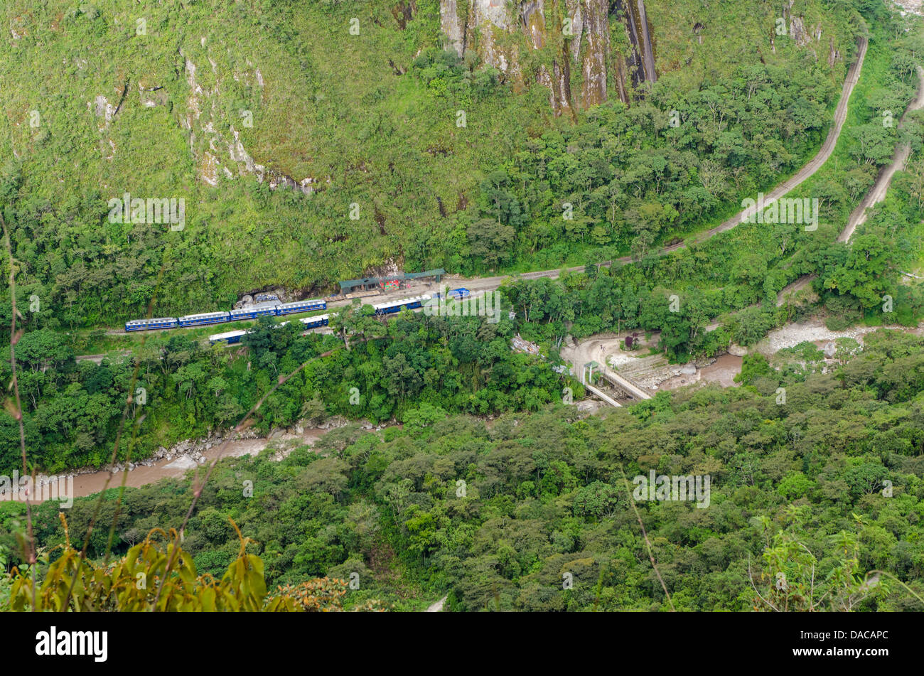 Perurail railway train along the Urubamba River Machu Picchu, Aguas Calientes, Peru. Stock Photo