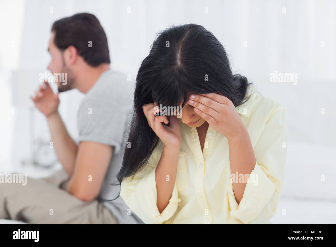 Woman calling and crying during dispute Stock Photo