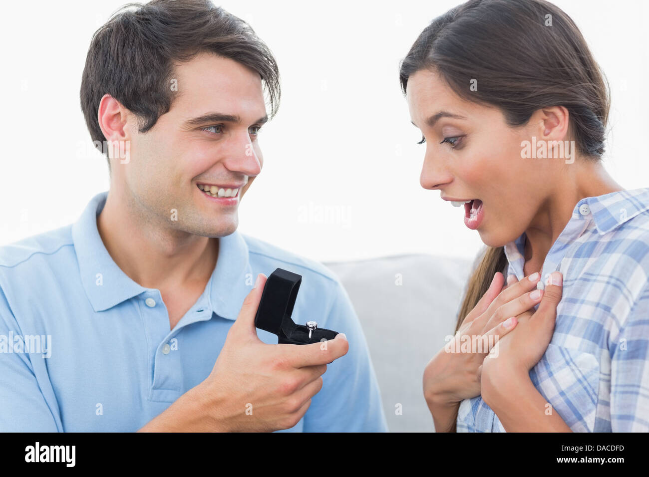 Man offering an engagement ring to his girlfriend Stock Photo Alamy