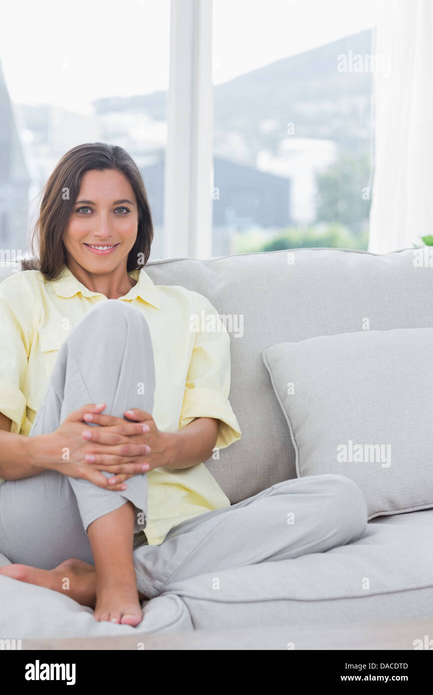 Portrait of a cheerful woman relaxing Stock Photo - Alamy
