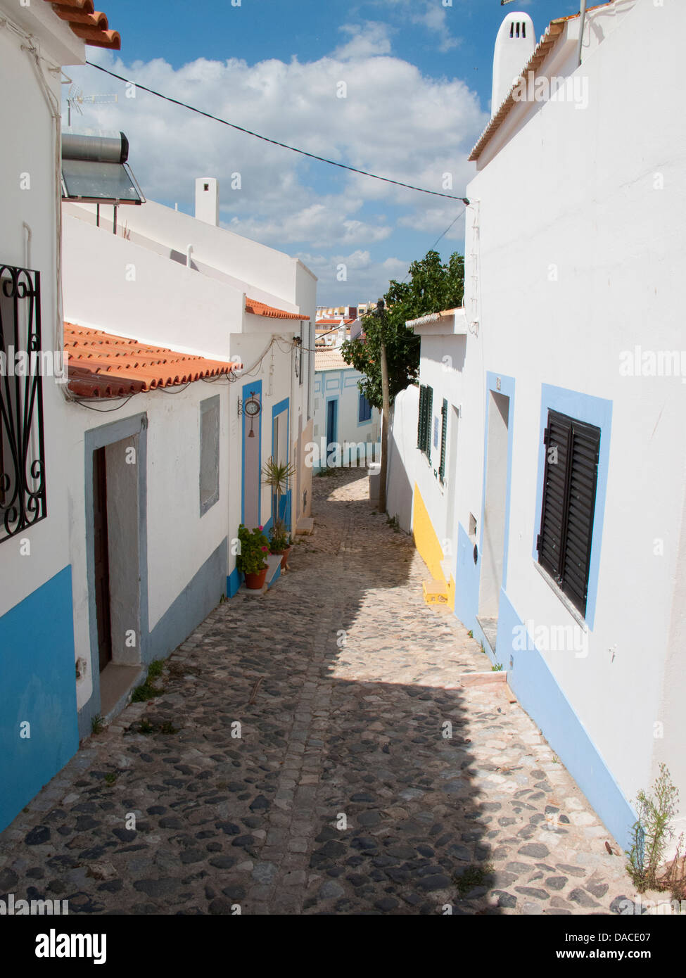 Village street in Ferragudo, the Algarve, Portugal Stock Photo
