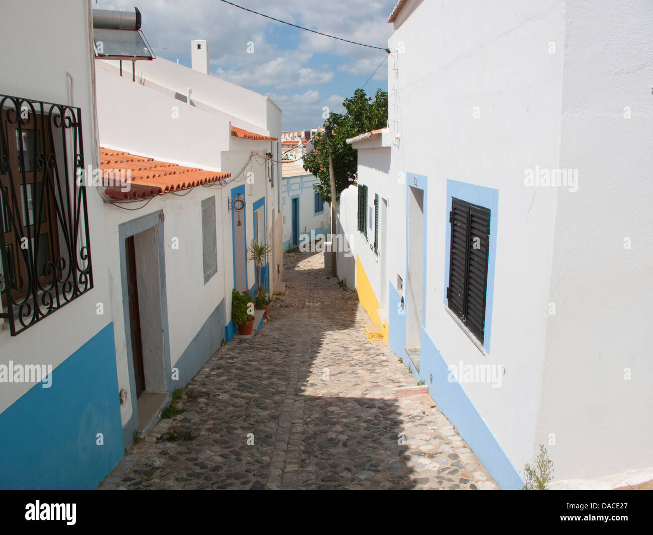 Village street in Ferragudo, the Algarve, Portugal Stock Photo