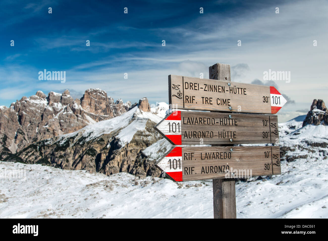 Hiking trail signs post in the Dolomites, Cadore, Veneto, Italy Stock Photo