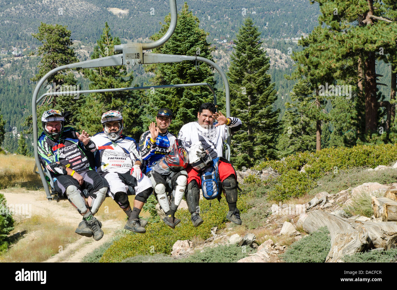 Mountain Bikers On Chairlift At Big Bear Lake California Stock