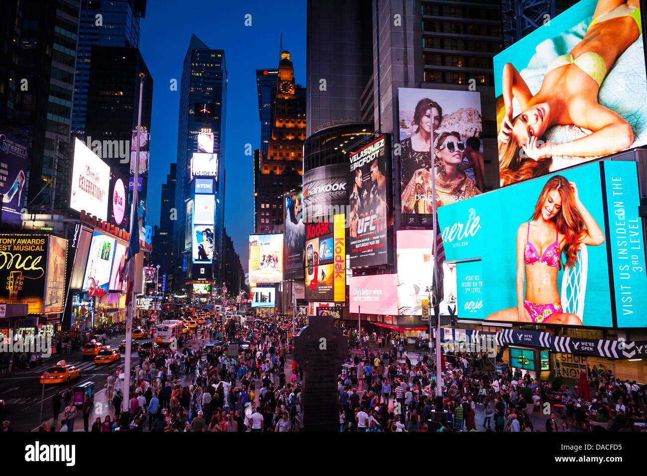 A crowded Times Square at night, Manhattan, New York City, USA Stock