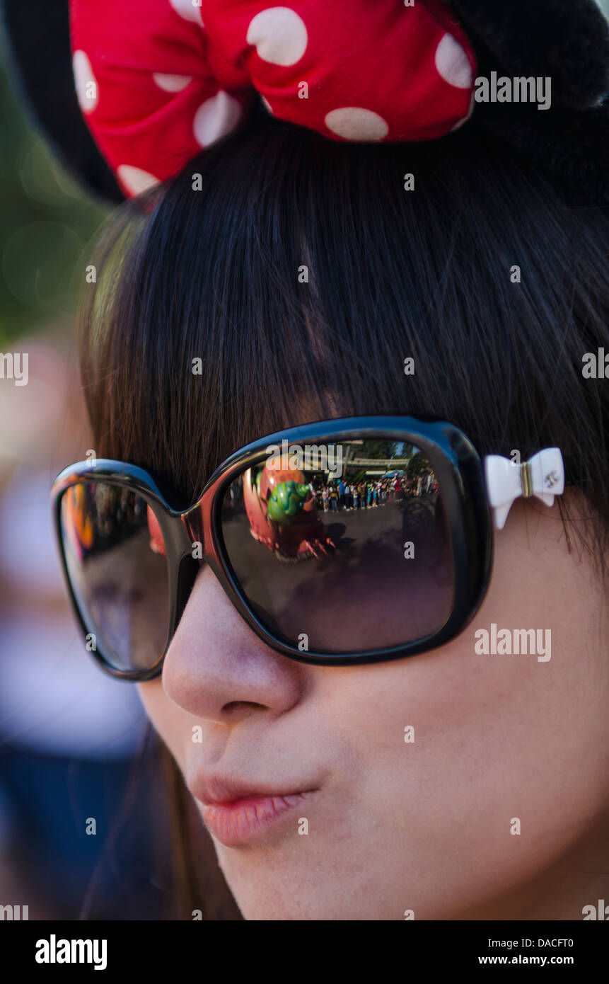 Reflections off girl's sunglasses Disneyland, Anaheim, California. Stock Photo