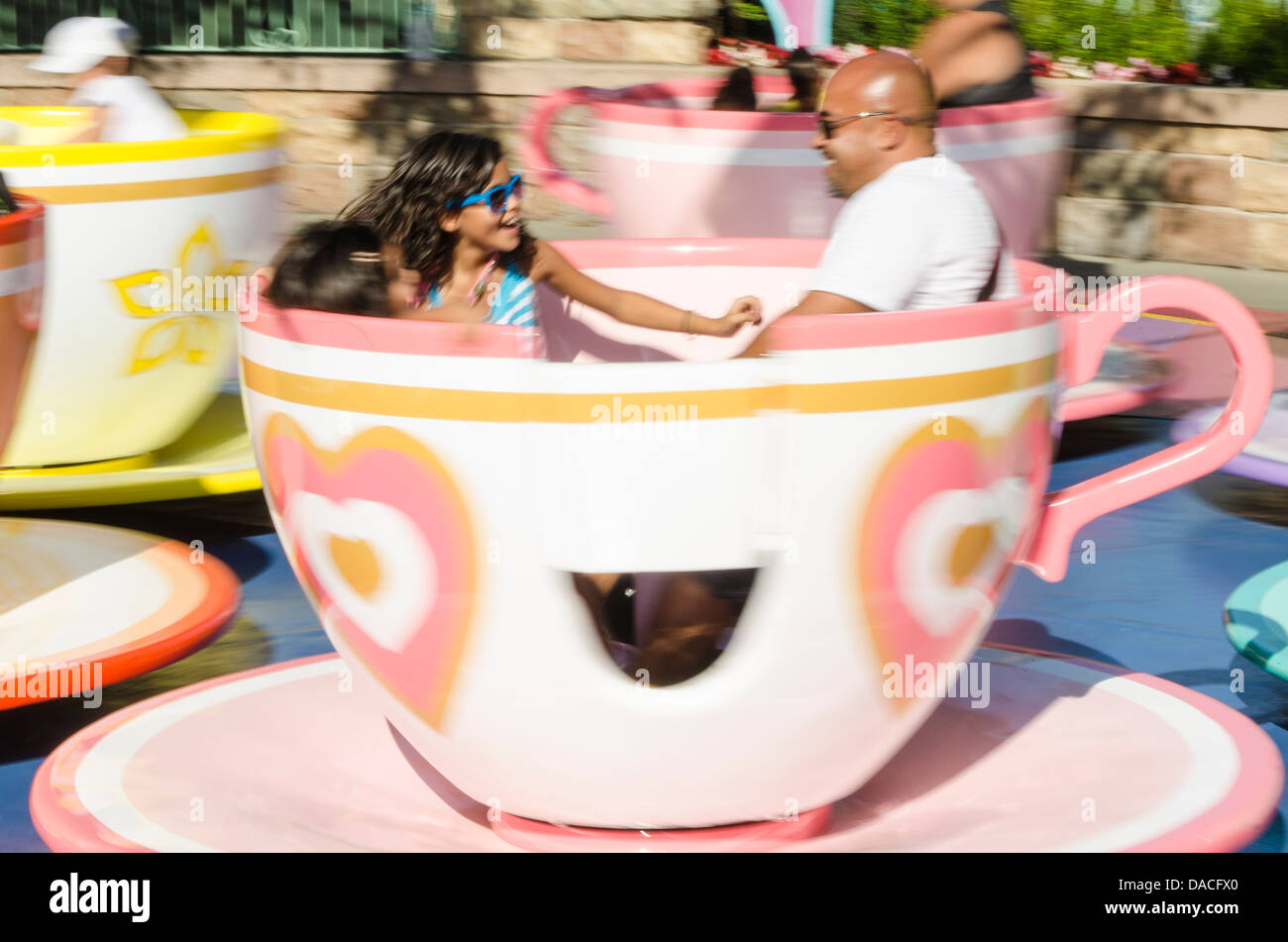 Tea cup ride disneyland amusement hires stock photography and images