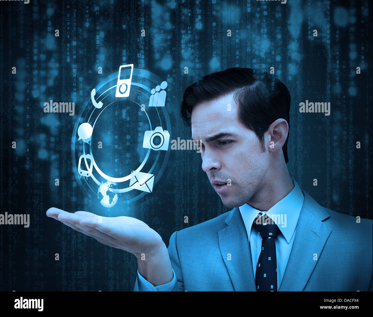 Businessman holding a hologram with smartphone applications Stock Photo