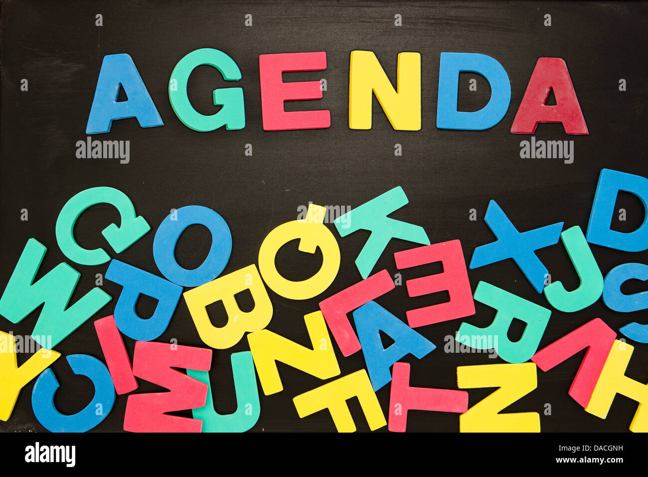 The word agenda written with colored letters Stock Photo