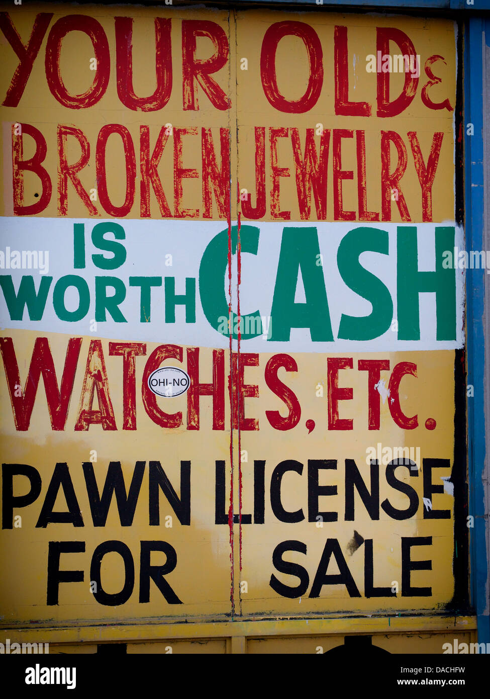 Hand painted sign for abandoned pawn shop in the Corktown neighborhood of Detroit Stock Photo