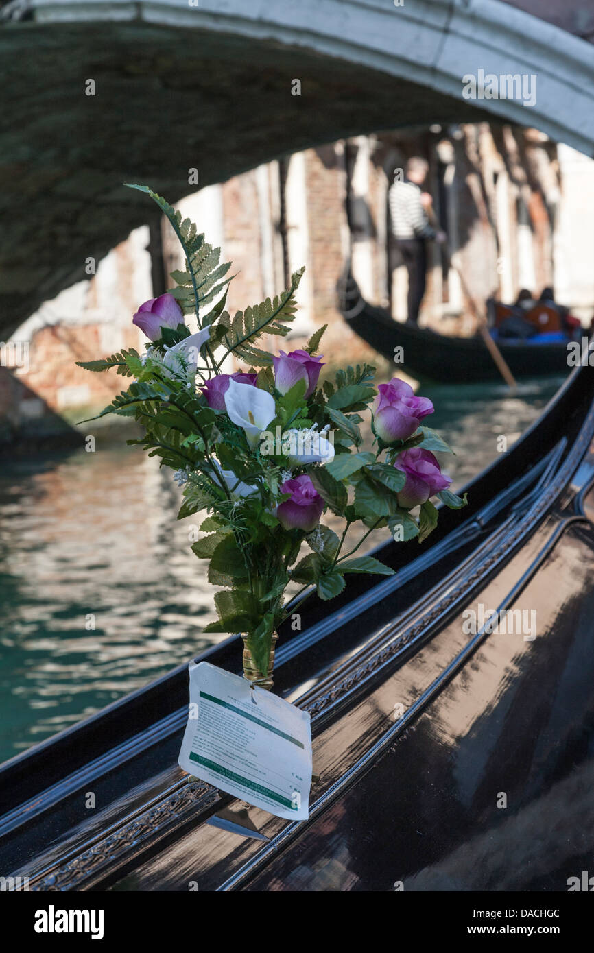 Flowers on gondola, Venice, Italy Stock Photo - Alamy