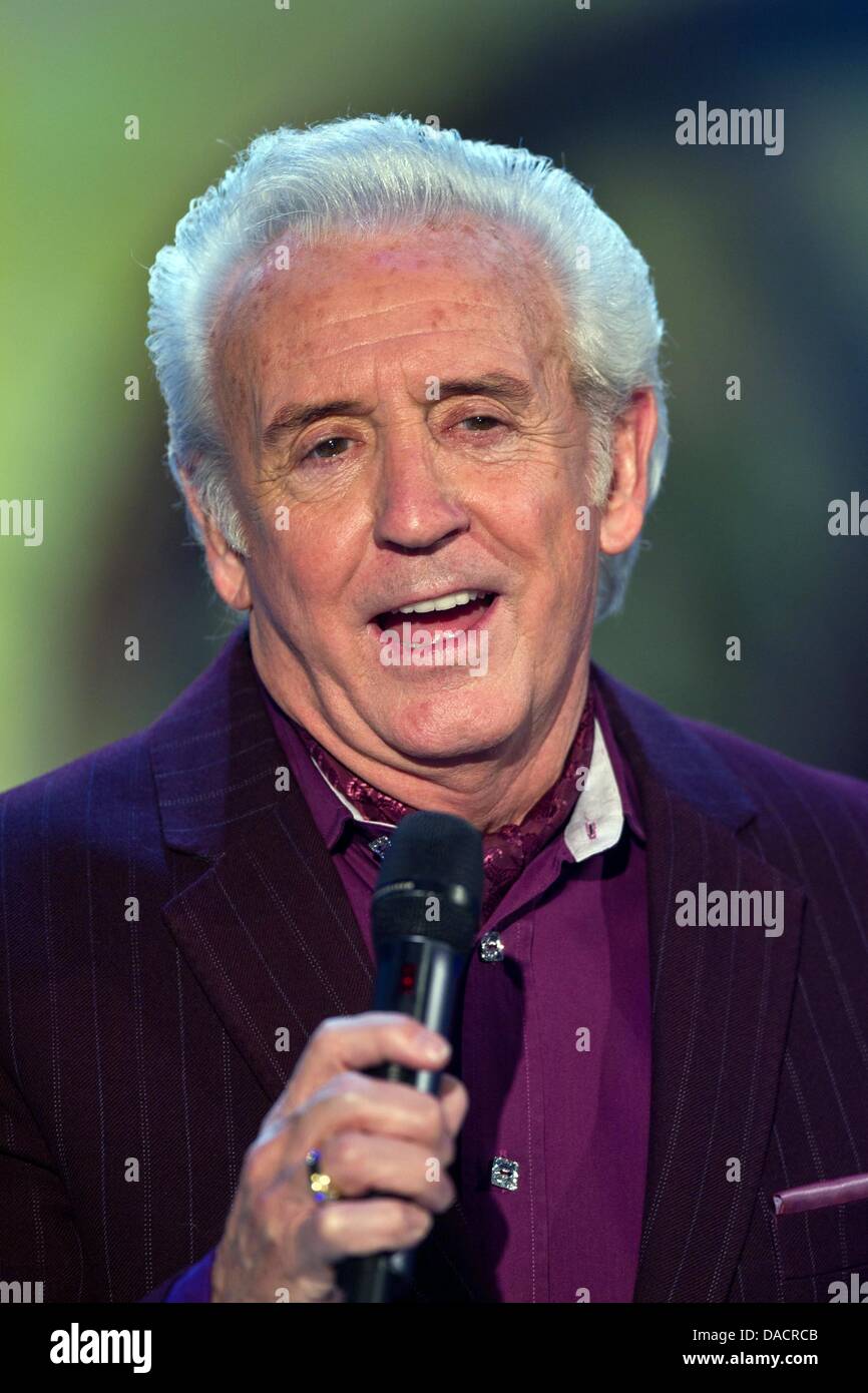 British folk singer Tony Christie performs during the rehearsal of the German television show 'musik fuer Sie' (Music for you) in Magdeburg, Germany, 09 December 2011. Photo: Jens Wolf Stock Photo