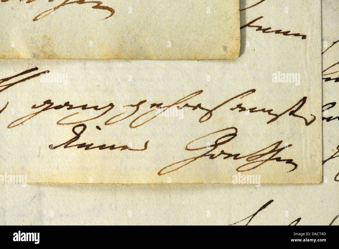 The handwritten 'Your most humble servant Goethe' is seen on a piece of paper at the Saxonian State Archives in Leipzig, Germany, 14 December 2011. The State Archives puts 25 letters by Johann Wolfgang von Goethe (1749-1832) on display which had until now been missing. Photo: PETER ENDIG Stock Photo
