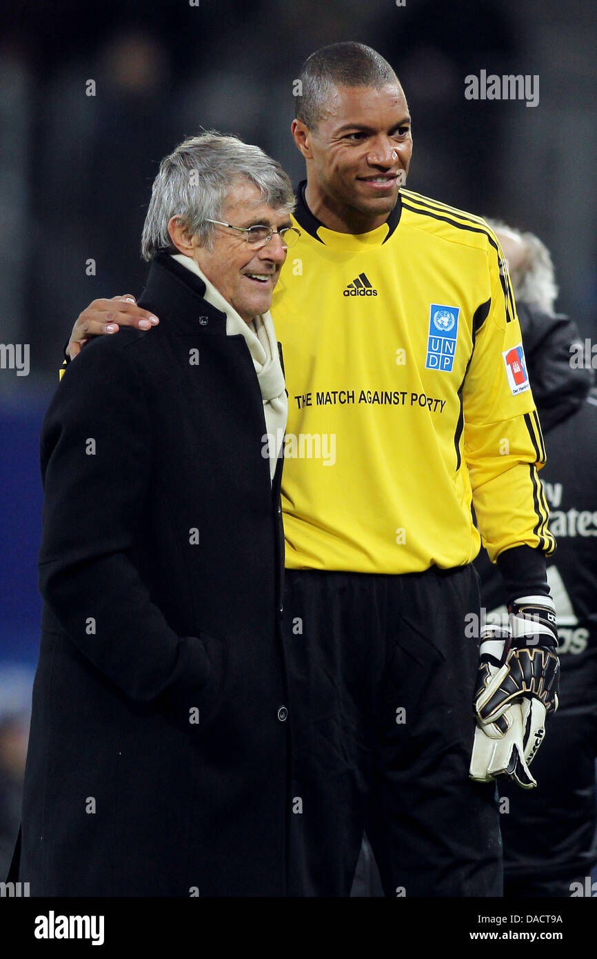 Coach Bora Milutinovic (l-r) and keeper Dida of «Team Ronaldo, Zidane and friends» talk after the charity soccer match against poverty between «Team Ronaldo, Zidane and friends» and «HSV Allstars» at Imtech Arena in Hamburg, Germany, 13 December 2011. Photo: Malte Christians dpa/lno Stock Photo
