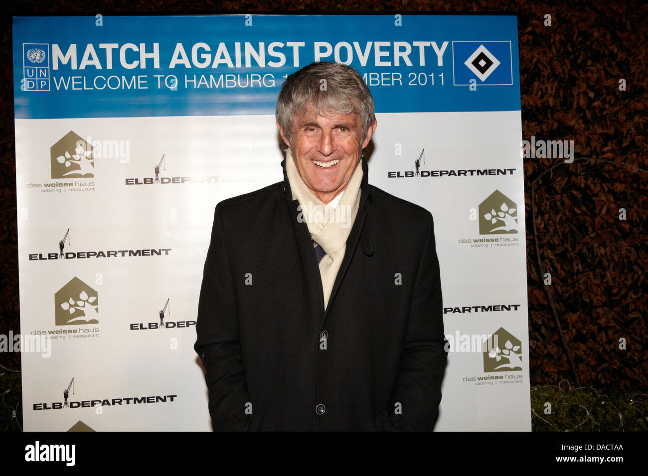 Bora Milutinovic arrives to the after match dinner at Weisses Haus restaurant after the 'Match Against Poverty' match in Hamburg, Germany, 13 December 2011. A selection of world soccer players including Ronaldo and Zinédine Zidane played Hamburg SV with a few additional all-stars to collect donations for the United Nations Development Programme (UNDP) for humanitary help to the Hor Stock Photo
