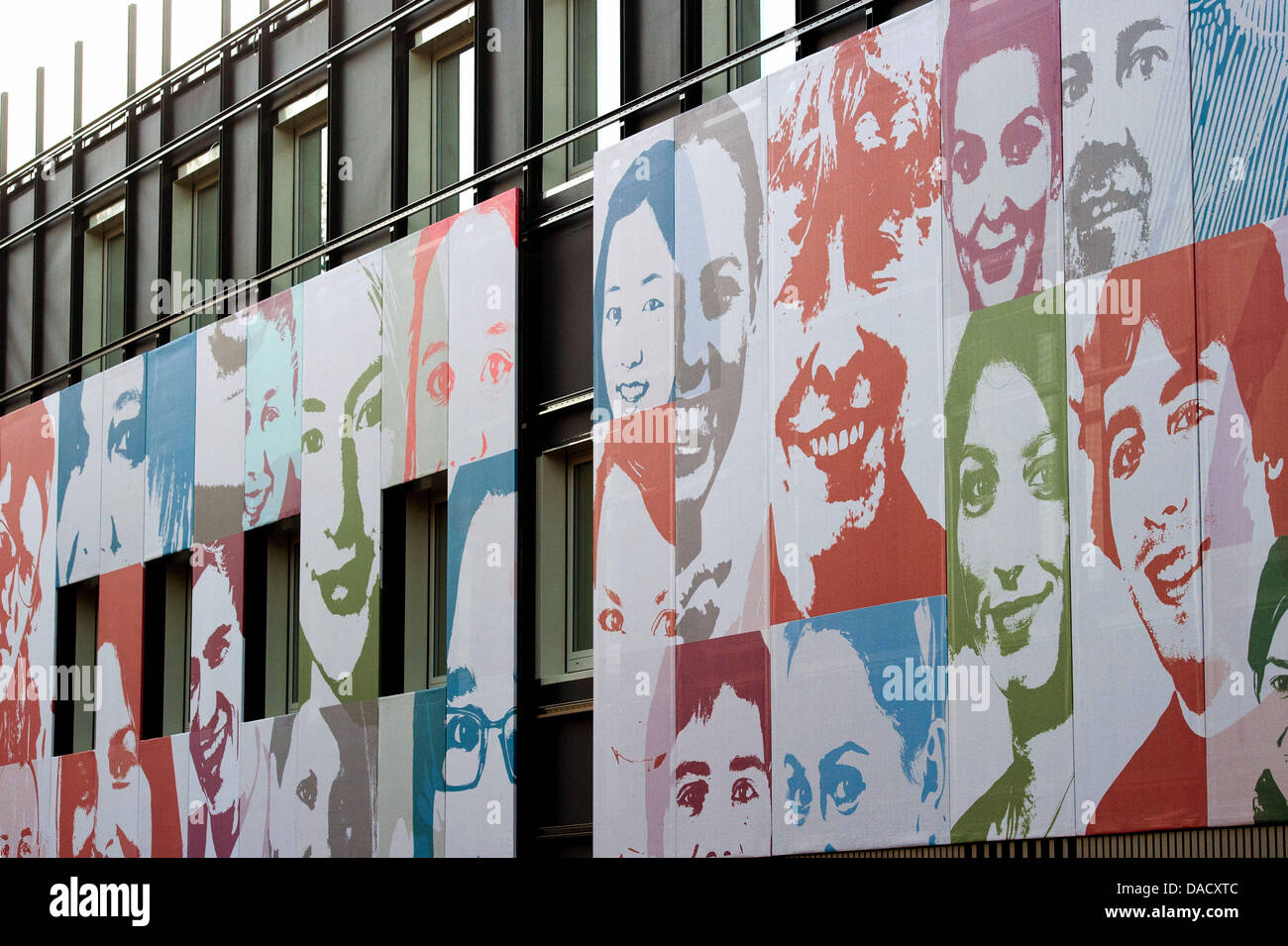 Portraits of students and employees of the Viadrina European University are featured at the fassade of the future datacentre of the university in Frankfurt Oder, Germany, 20 December 2011. About 400 portraits, upon them one of former president Prof.Dr. Gesine Schwan (above-C), decorate the fassade of the building until its completion under the title 'Viadrina-Facewall'. Photo: Patr Stock Photo