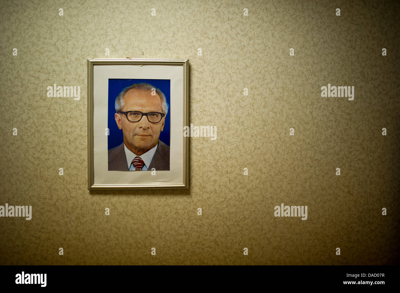 A view of the interrogation room with a picture of Erich Honecker, former head of the  Socialist Unity Party of East Germany, on display in the former remand center at the regional office of the East German Ministry for State Security, also known as Stasi, in Dresden, Germany, 5 December 2011. The former remand center serves now as a Stasi memorial place. The sponsoring organisatio Stock Photo