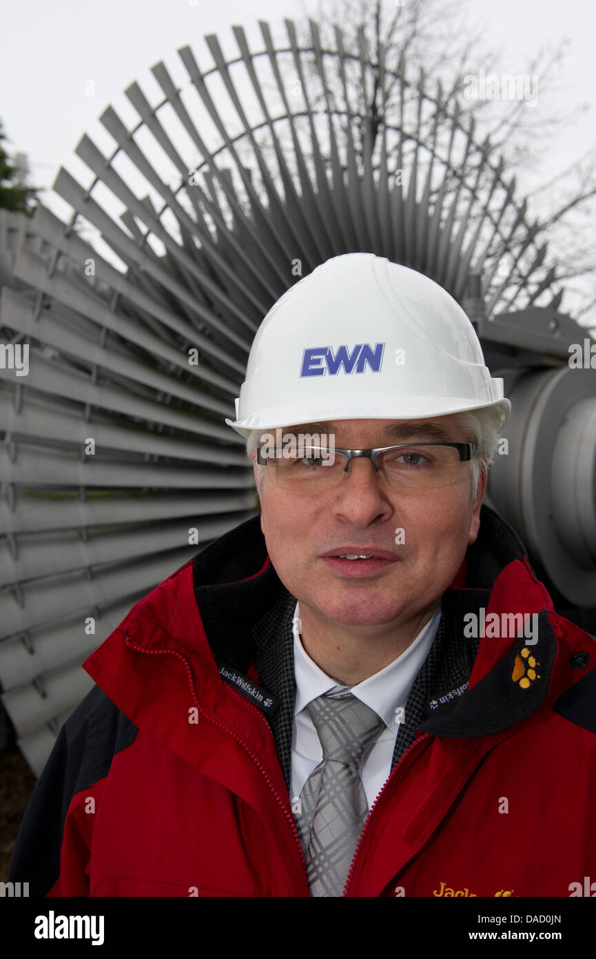 Managing director of Energiewerke Nord GmbH (EWN) Henry Cordes smiles on the site of EWN in Greifswald-Lubmin, Germany, 21 December 2011. EWN thinks a prolongued storage of nuclear waste beyond the year 2039 is becoming more and more likely. After a renewed start of attempts of the final disposal of nuclear waste a prolongued storage at the federally owned intermediate storage faci Stock Photo