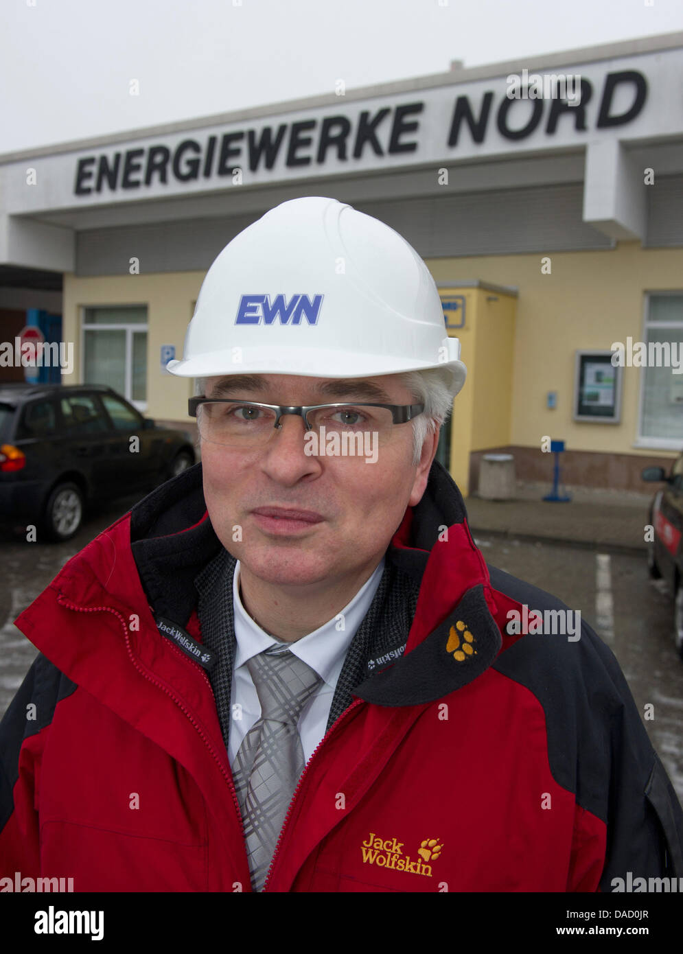 Managing director of Energiewerke Nord GmbH (EWN) Henry Cordes smiles on the site of EWN in Greifswald-Lubmin, Germany, 21 December 2011. EWN thinks a prolongued storage of nuclear waste beyond the year 2039 is becoming more and more likely. After a renewed start of attempts of the final disposal of nuclear waste a prolongued storage at the federally owned intermediate storage faci Stock Photo