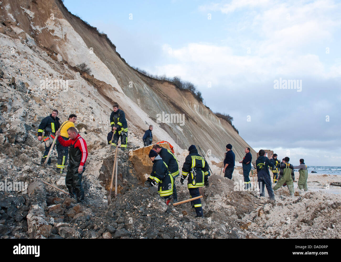 Firefighters search for a missing little girl at a scene of an accident ...