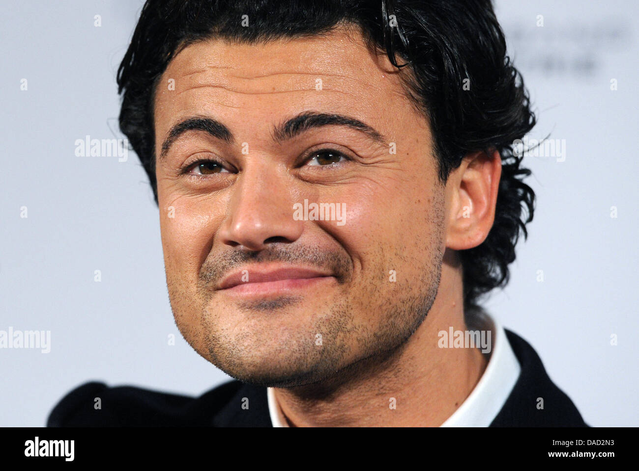 Italian tenor Vittorio Grigolo smiles at the 'Echo Klassik 2011' award ceremony at the Konzerthaus in Berlin, Germany, 02 October 2011. Grigolo won the prize for best newcomer and dedicated his ward to Zubin Metha. Since 1994, the Phono Academy selects outstanding works in classical music, and since 1996, the ceremony airs on TV. Photo: Rainer Jensen Stock Photo