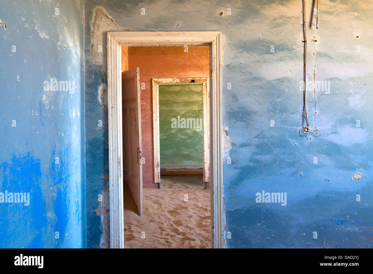 Interior consumed by sands of the Namib in the abandoned mining town of Kolmanskop, Forbidden Diamond Area, Luderitz, Namibia Stock Photo