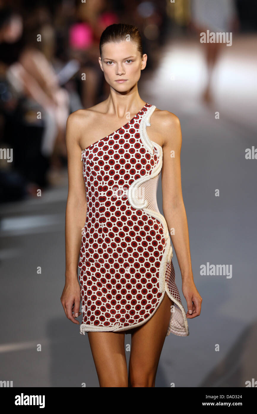 A model wears a creation by British designer Stella McCartney as part of  the women's ready to wear spring/summer 2012 collection presented during  the Paris Pret-a-Porter fashion week, in Paris, France, 3