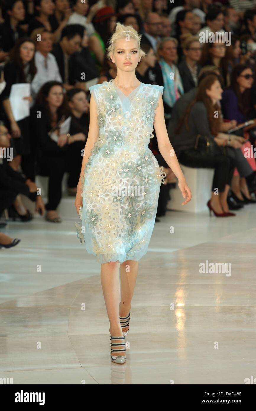 A model wears a creation by French designer Louis Vuitton as part of the  women's ready to wear spring/summer 2012 collection presented during the  Paris Pret-a-Porter fashion week, in Paris, France, 5