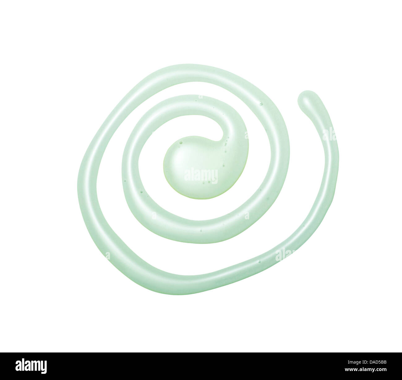 green beauty cream swirl gel cut out onto a white background Stock Photo