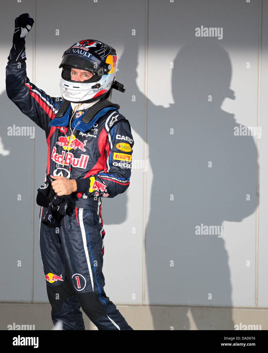 Vettel 2011 New Formula One champion German Sebastian Vettel of Red Bull celebrates ...