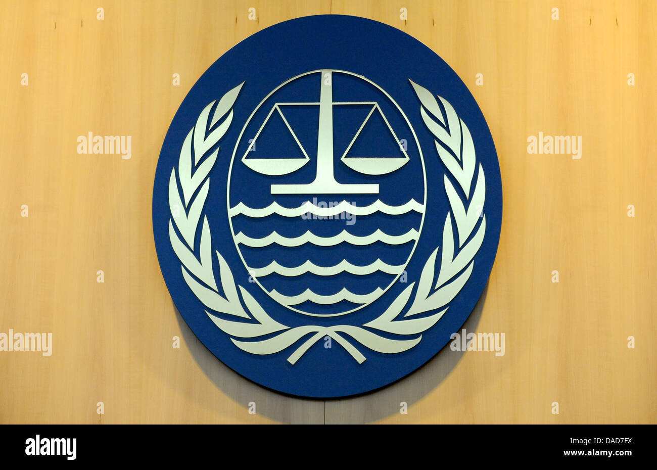 The emblem of the International Tribunal for the Law of the Sea is fixed above the entrance to the main court room in Hamburg, Germany, 05 October 2011. In August 1981, the United Nations Conference on the Law of the Sea declared Hamburg to the seat of the Tribunal. Photo: Angelika Warmuth Stock Photo