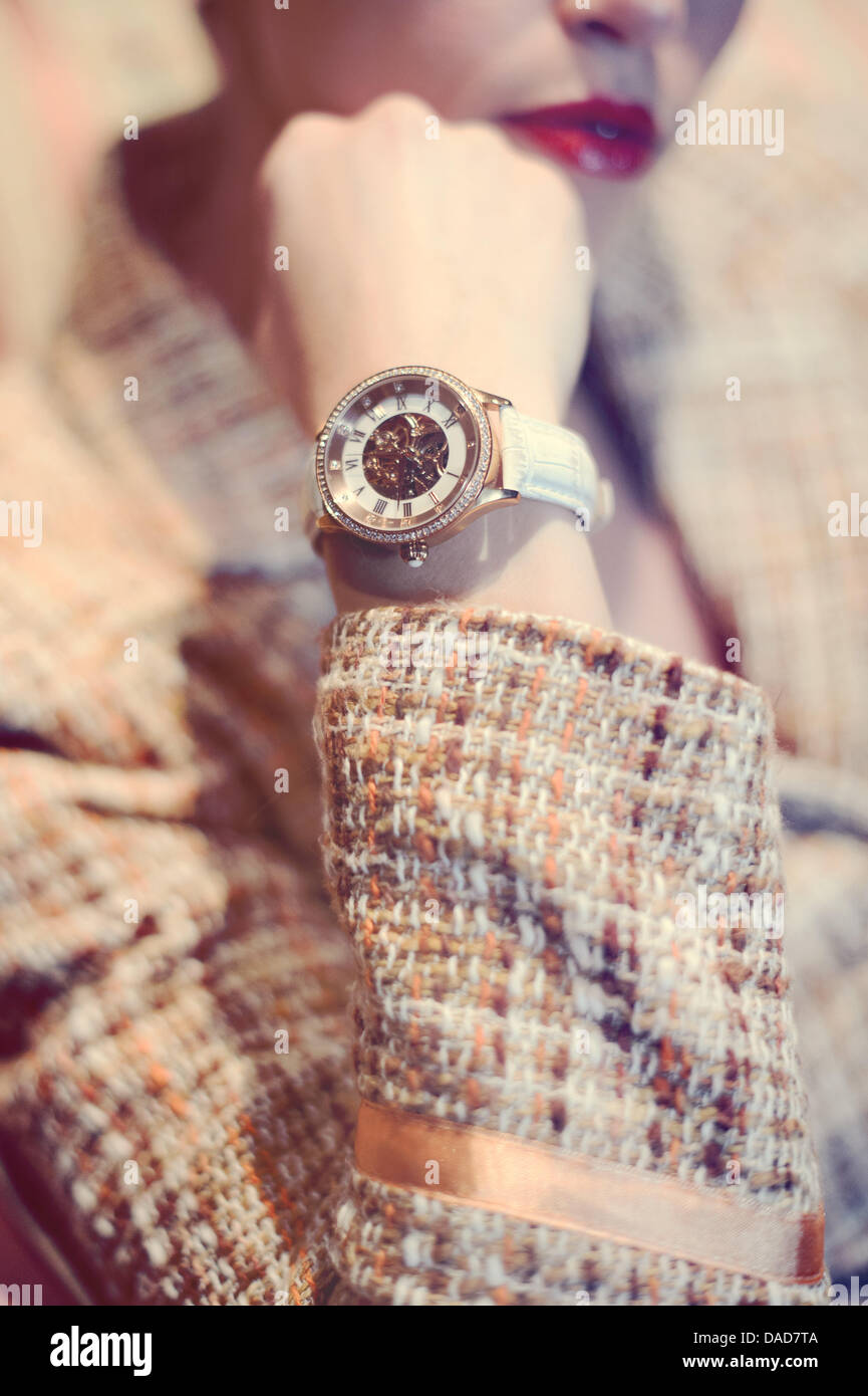 Luxury - Close up of woman's hand with a wrist watch Stock Photo