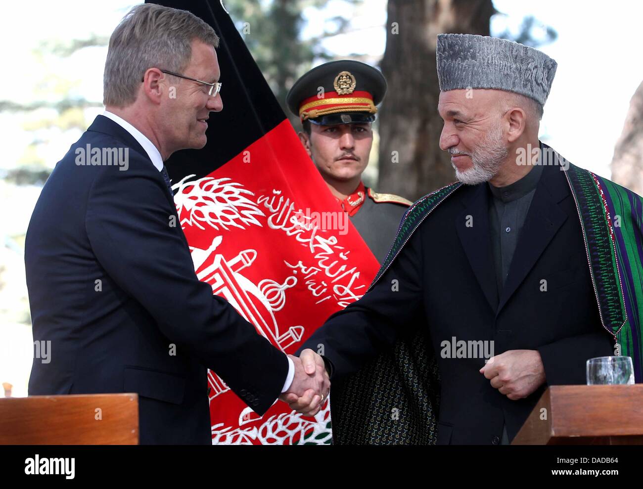 German President Christian Wulff is welcomed by the Afghan President Hamid Karsai (R) in Kabul, Afghanistan, 16 October 2011. The German head of state is cureently in Afghanistan for a state visit. Photo: WOLFGANG KUMM Stock Photo