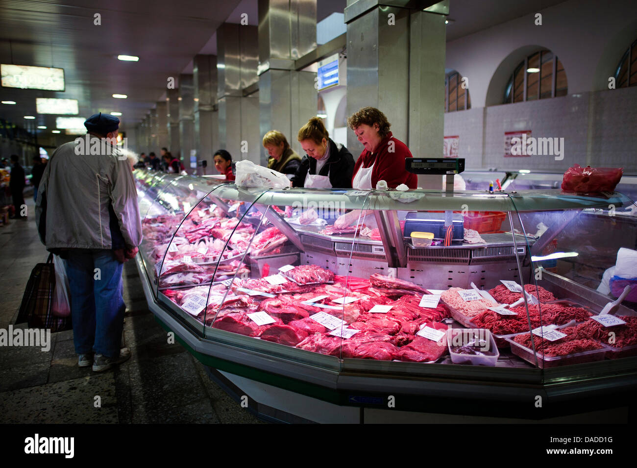 Meat is presented at a butcher's stall inside the market hall in St ...