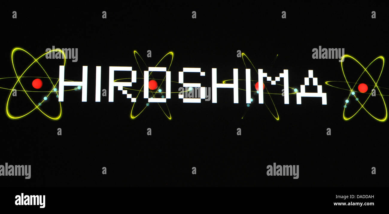 A 3D video installation with atom symbols and the writing 'Hiroshima' is seen during the video press preview of the exhibition 'Kraftwek 3-D Video Installation' at the Kunstbau of the Municipal Gallery in Lenbachhaus in Munich, Germany, 13 October 2011. The design of the exhibition is meant to make the minimalistic sounds and images of Kraftwerk tangible to a broad public. The vide Stock Photo