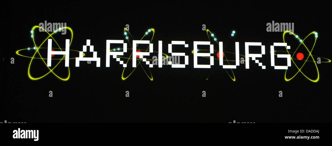 A 3D video installation with atom symbols and the writing 'Harrisburg' is seen during the video press preview of the exhibition 'Kraftwek 3-D Video Installation' at the Kunstbau of the Municipal Gallery in Lenbachhaus in Munich, Germany, 13 October 2011. The design of the exhibition is meant to make the minimalistic sounds and images of Kraftwerk tangible to a broad public. The vid Stock Photo
