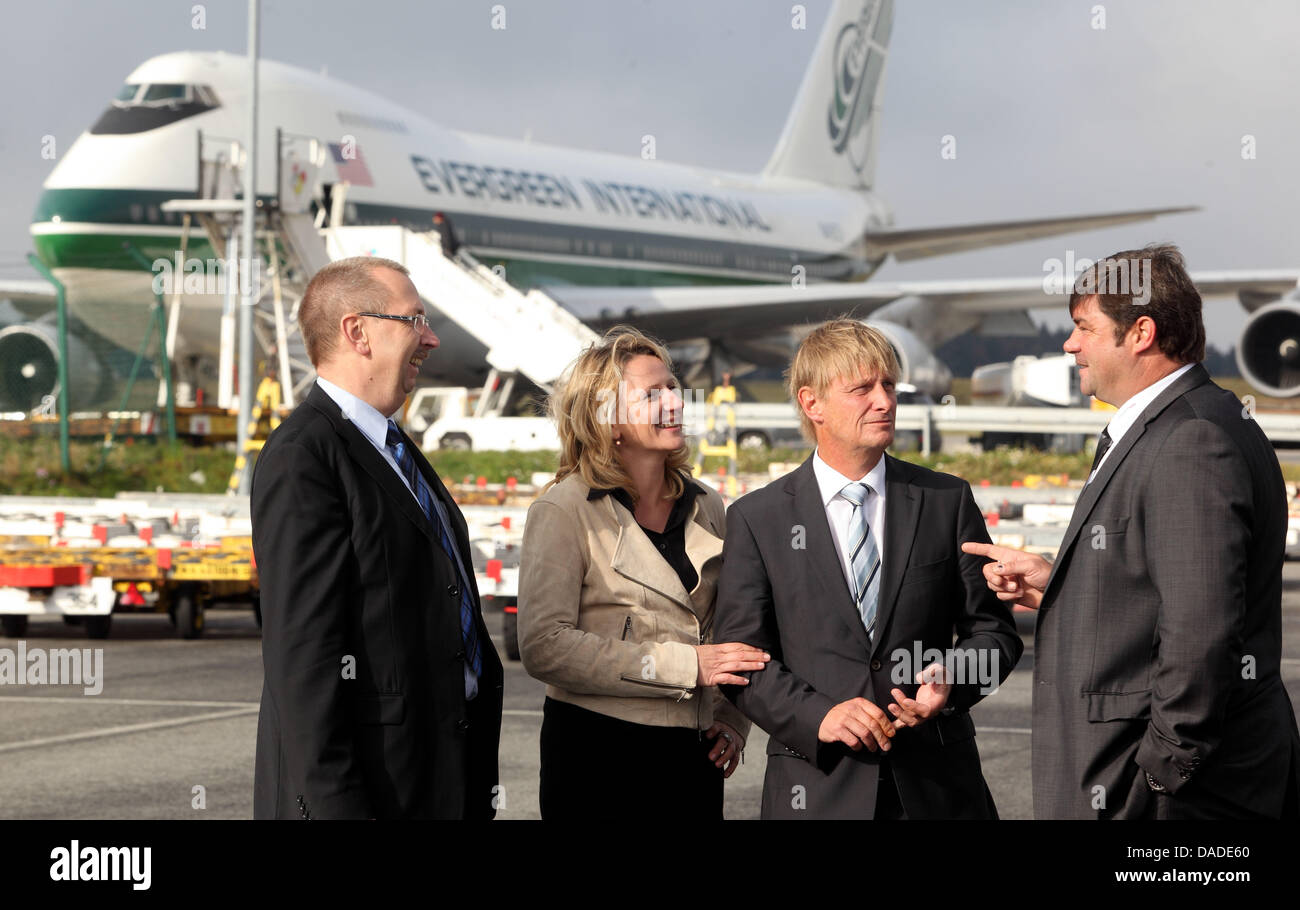 Members of the management board of Frankfurt-Hahn Airport GmbH (L-R), Bernd Mueller, Ulrike Mueller, Joerg Schumacher and Stefan Maxeiner, present their concept for the privatization of the majority state-owned former military airbase in Hunsrueck, Germany, 20 October 2011. In the framework of a management buy out, they want to take over a majority of shares of the airport. Photo:  Stock Photo