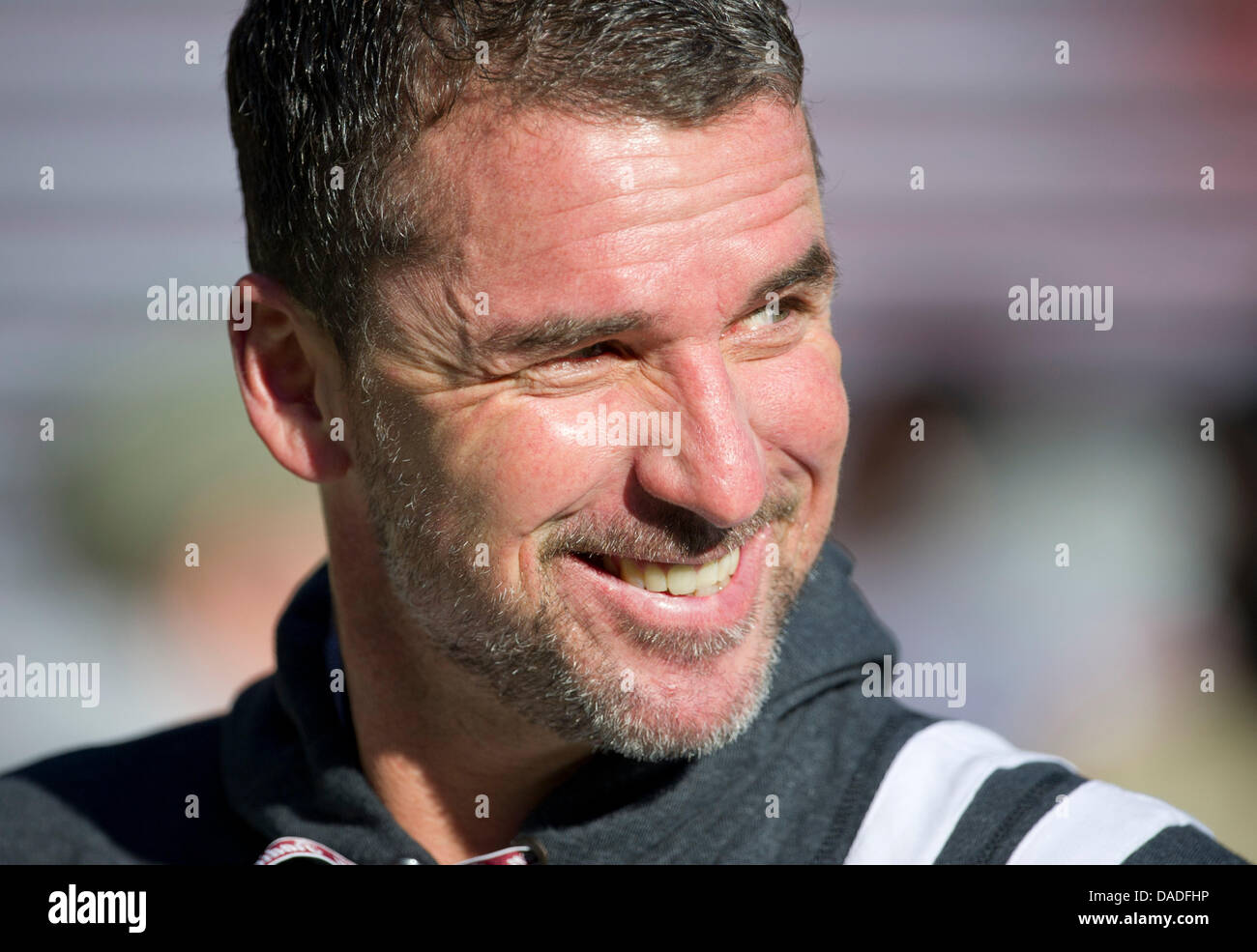 Kaiserslautern's head coach Marco Kurz smiles before the German Bundesliga match between FC Kaiserslautern and SC Freiburg at the Fritz-Walter-Stadium in Kaiserslautern, Germany, 22 October 2011. Photo: UWE ANSPACH  (ATTENTION: EMBARGO CONDITIONS! The DFL permits the further  utilisation of the pictures in IPTV, mobile services and other new  technologies only no earlier than two h Stock Photo