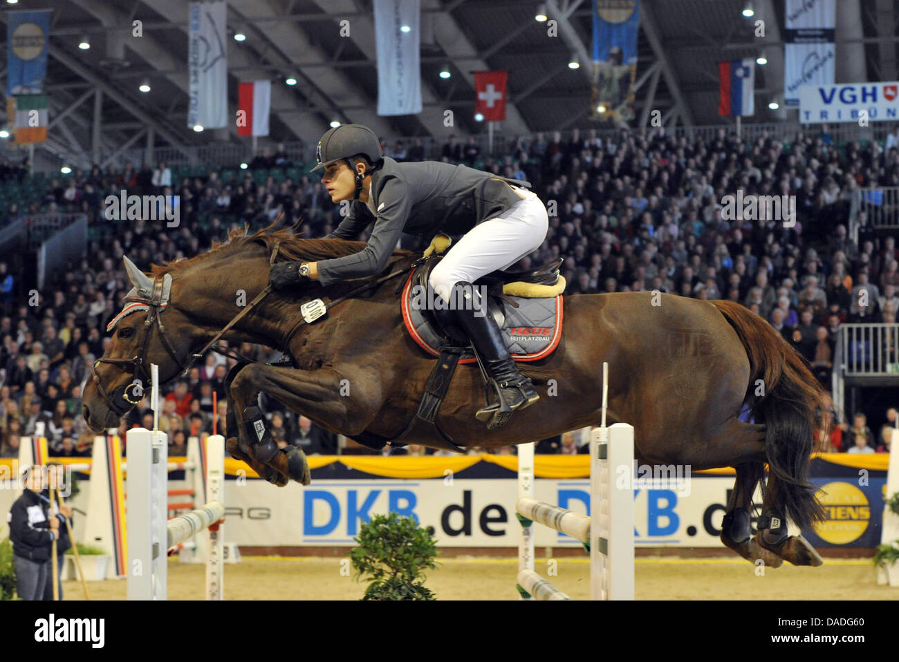 The German equestrian Joerg Oppermann in action on his horse Che Guevara during the German Classics in Hanover, Germany, 23 October 2011. Photo: Jochen Luebke Stock Photo