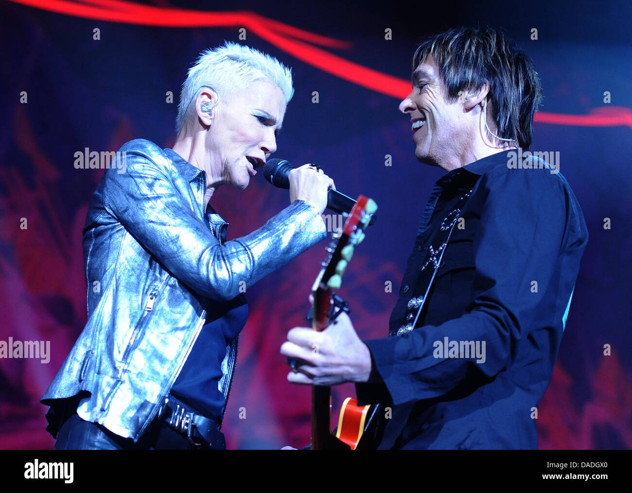 Marie Fredriksson and singer Per Gessle of the Swedish pop duo Roxette perform on stage of the o2 World in Berlin, Germany, 24 October 2011. The musicians present their new album 'Charm School'. Photo: Britta Pedersen Stock Photo